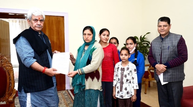 Lt Governor hands over appointment letter to martyr civilian Suneel Pandith’s wife