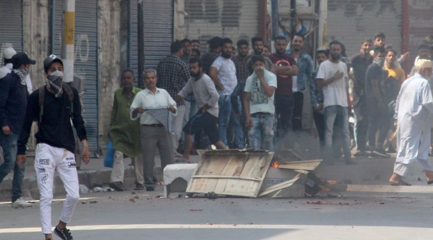 Spontaneous shutdown was observed at several places in Kashmir after clashes broke out between youths and security forces following rumours about scrapping of Article 35A, a police official said.