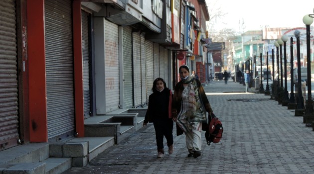 A view of the deserted road at Residency road during the weekend lockdown in Srinagar on Saturday.