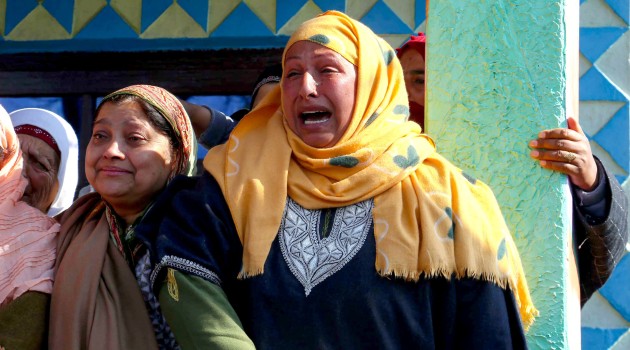 Family members and relatives of Jammu and Kashmir Light Infantry Sameer Ahmad Malla mourn during his funeral in Budgam on Friday. Malla’s body was recovered from Labran village yesterday after he went missing a month ago