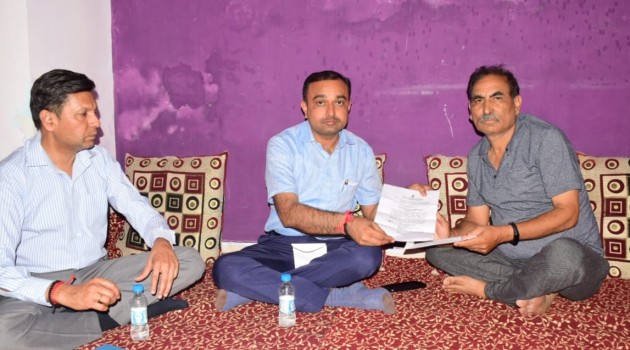 Div Com Jammu hands over Appointment letter, Ex gratia amount to Rahul Bhat’s family