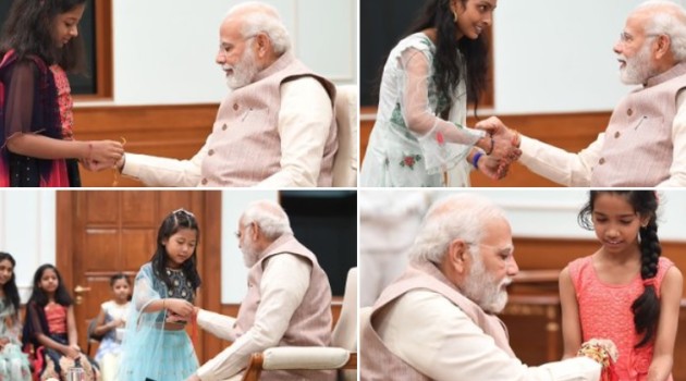 PM celebrates Raksha Bandhan with youngsters at his residence in New Delhi