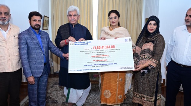 VC KVIB J&K submits Rs 180.41 lakh cheque to Lt Governor to be refunded to KVIC, GOI