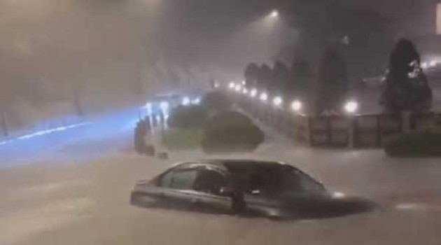 Hong Kong fights flooding after typhoon brings heavy rainfall