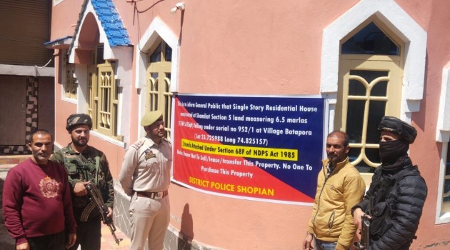  Police attaches illegal property worth Lakhs of notorious drug peddler in Shopian